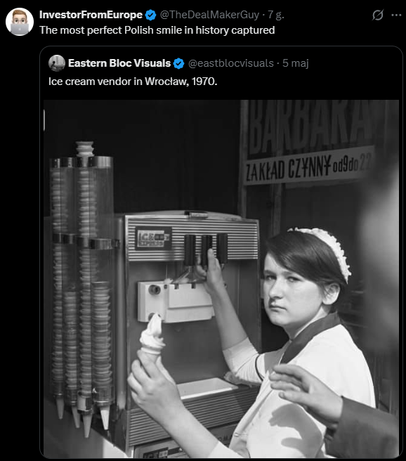 Black-and-white picture of a woman by the ice cream vending machine in a special attire making an ice cream, looking at the camera with most bored and lifeless look you could ever experience. It is posted with a caption "Ice cream vendor in Wrocław, 1970", and reposted with a comment: "The most perfect Polish smile in history captured".